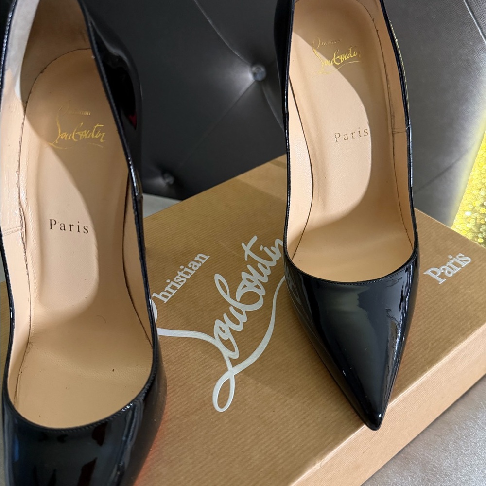 Christian Louboutin Black Patent Heels
Original Shoe bags and box included